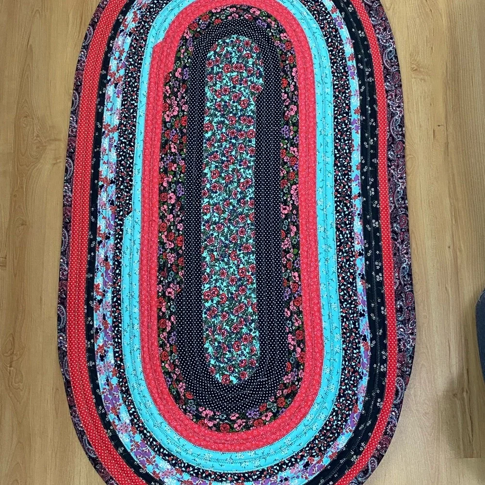 Oval Floral Jelly Roll Rug in Red, Black & Turquoise